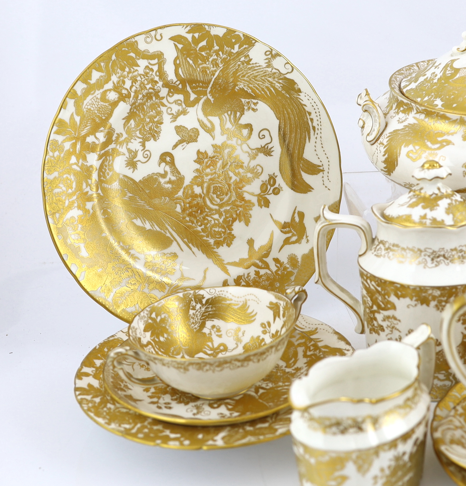 An extensive Royal Crown Derby Gold Aves dinner and tea service